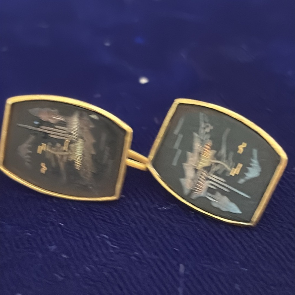 Marked Japan damascene screw back earrings,